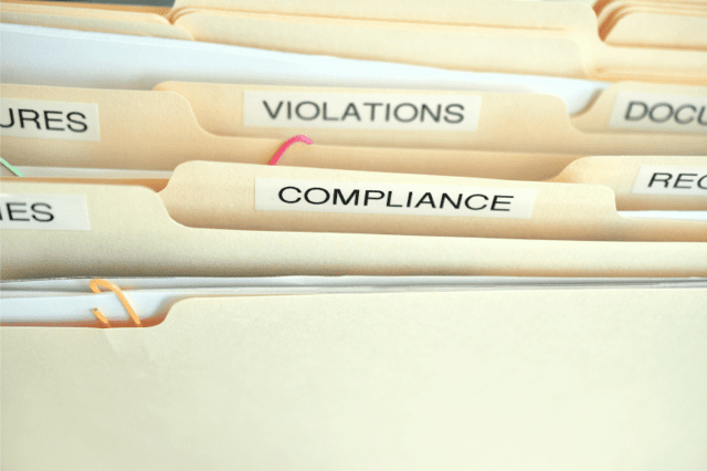 Risk management folders with violations and compliance for National Safety Month